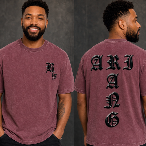 A man modeling a washed mauve short-sleeve t-shirt, showing both the front and back views. The front features a small black gothic BTS logo on the left chest, and the back features large, raised black gothic letters spelling 'ARIRANG'.